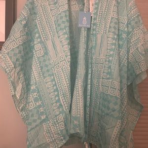 New with tags. Beach cover up wrap